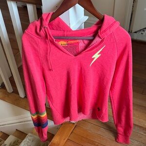 Aviator Nation Neon Pink Hoodie with Lightning Bolt & Rainbow Sleeve